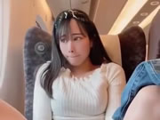 Asian slut girl masturbating on the plane